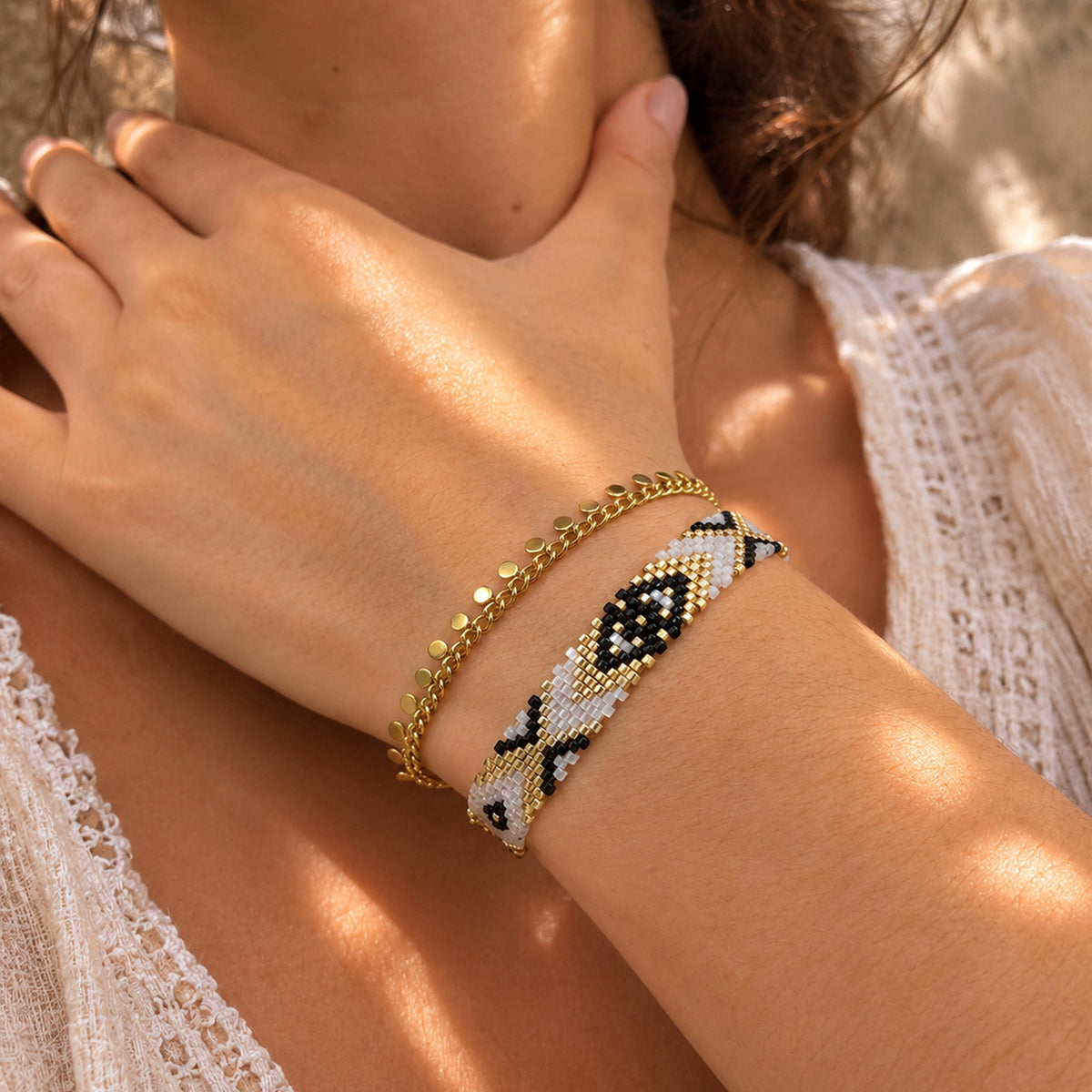 Close-up of the Woven Roots Ivory handwoven Miyuki bracelet on the wrist