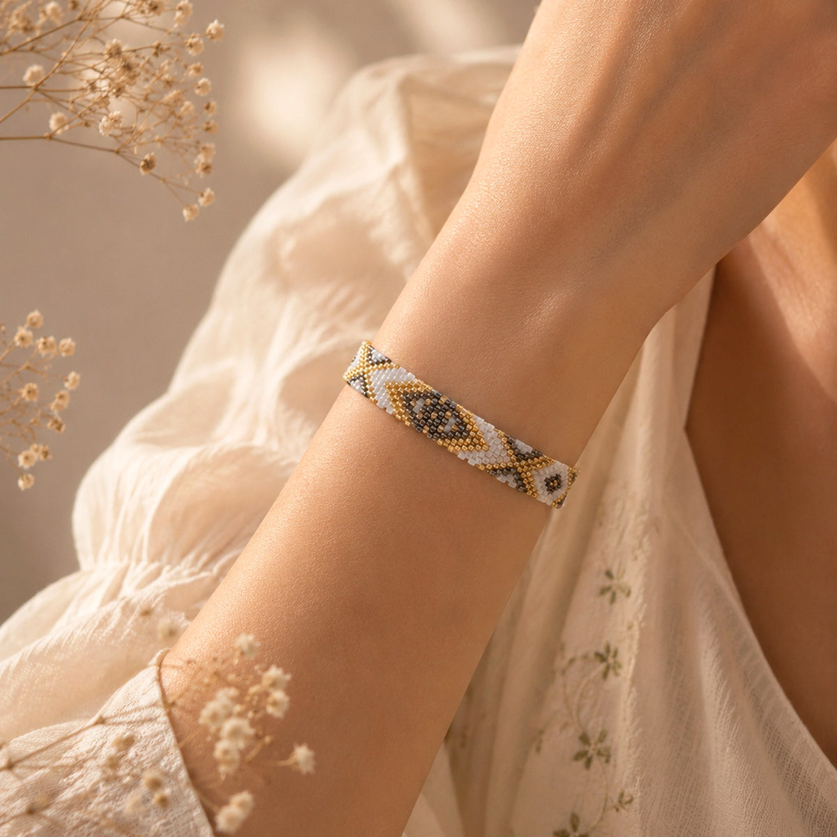 Model wearing the Woven Roots Pearl handwoven Miyuki bracelet